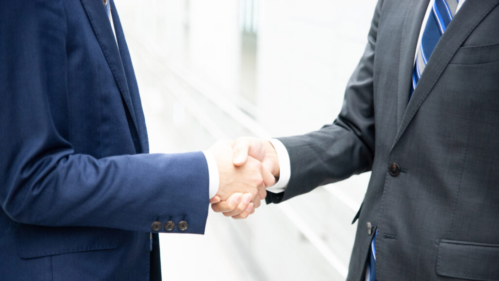 握手している信頼関係