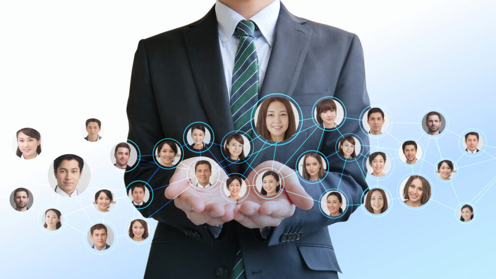 ビジネスマン、たくさんの人をあつかう