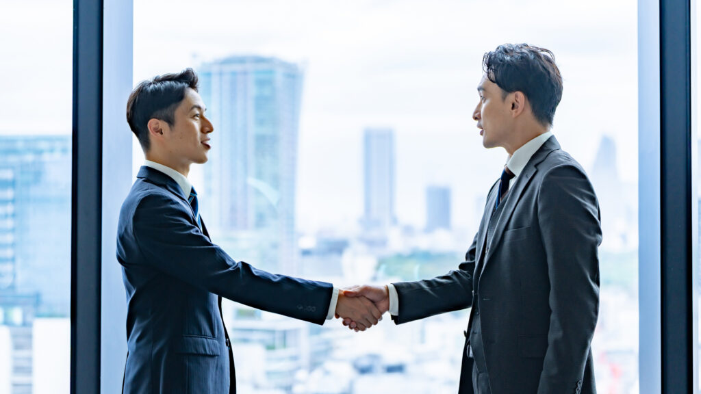 2人ビジネスマンの握手